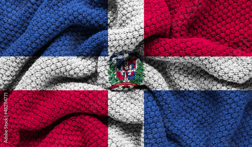 Dominican Republic flag on knitted fabric. 3D-image