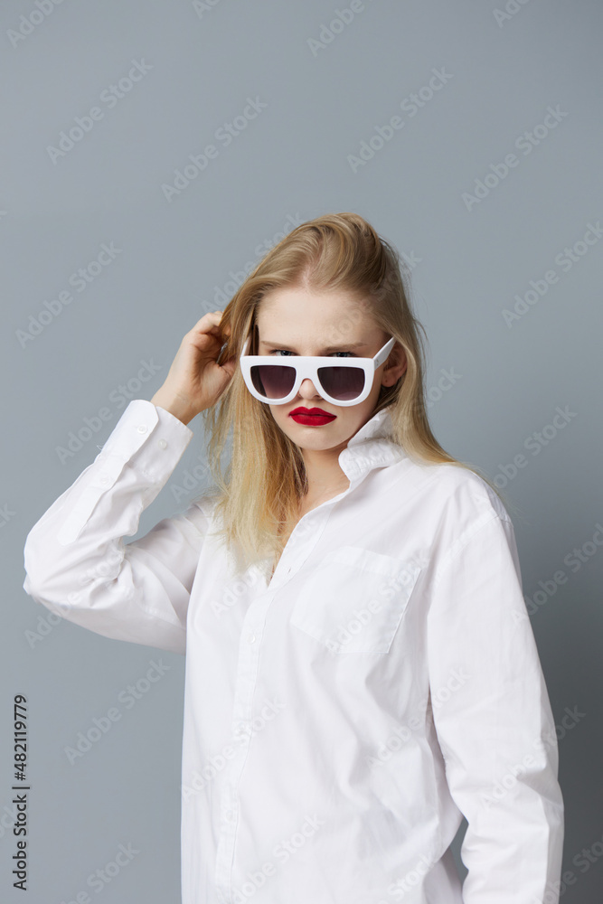 pretty woman in white shirt sunglasses isolated background pretty woman in white shirt sunglasses isolated background