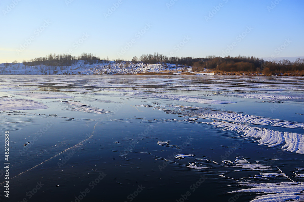 Fototapeta premium ice texture cracks baikal, abstract background winter ice transparent blue