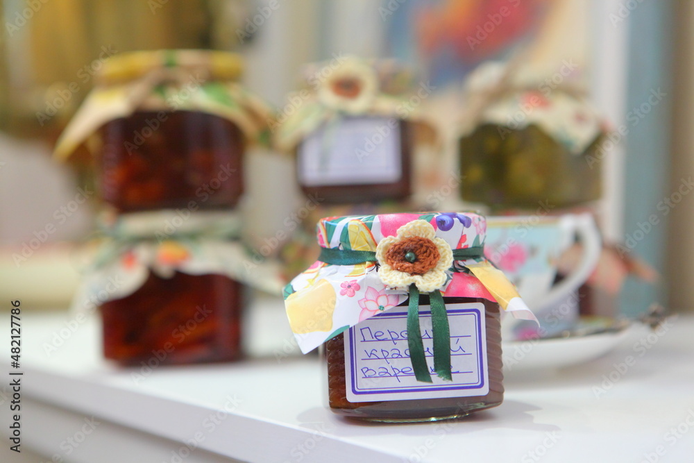 Assorted jams on the table in the kitchen Assorted jams on the table in the kitchen