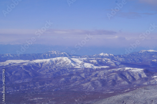 snow covered mountains © MICCHAMAN