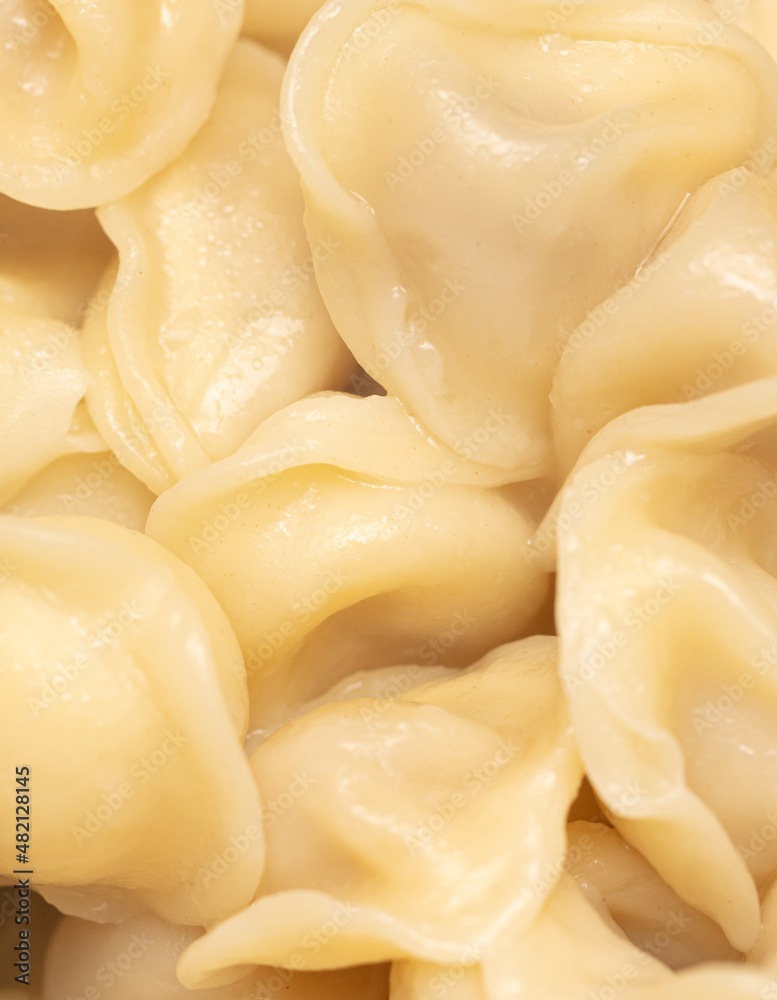 Boiled dumplings made from dough and meat. Boiled dumplings made from dough and meat.