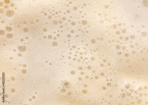 White foam in boiling water as an abstract background.