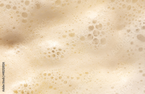 White foam in boiling water as an abstract background.