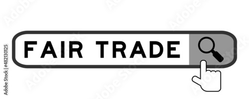 Search banner in word fair trade with hand over magnifier icon on white background