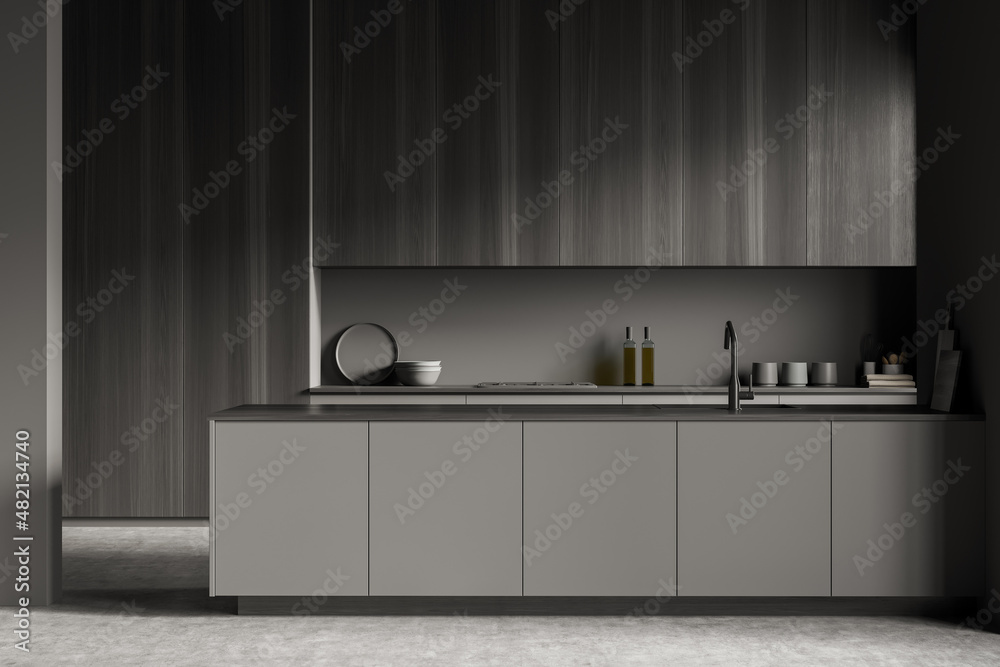 Grey kitchen set interior with table and shelves with kitchenware Stock