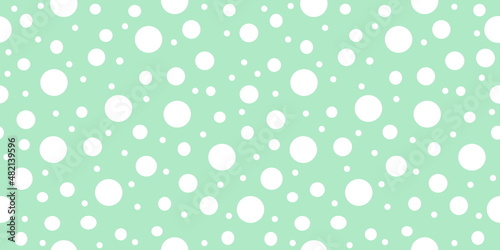 Seamless pattern with dots, green color background, spotted vector drawing 