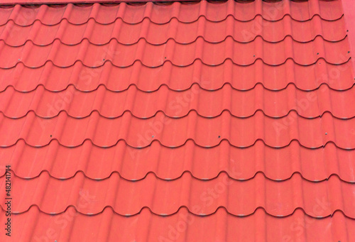 Red tile roof texture background. Roof tile seamless pattern protecting the house from the weather