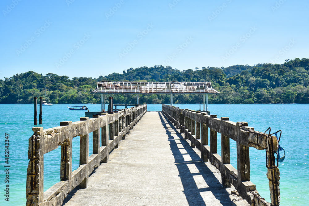 Landscape view of bridge and jetty in seaside with beautiful nature view.