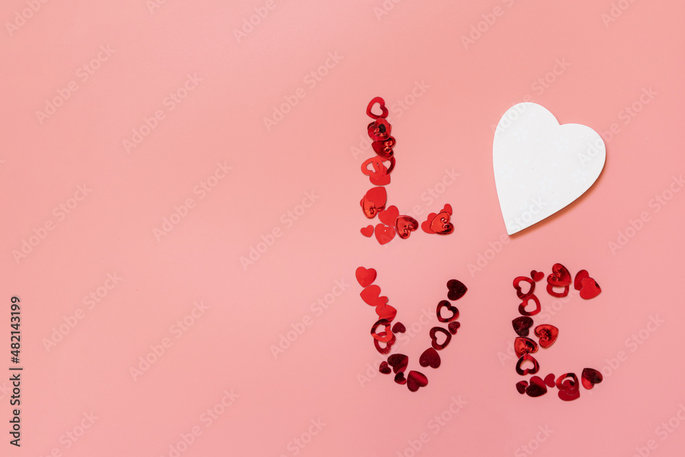 Valentines, love and wedding concept. Hearts love on pink background. Flat lay, top view. Copy space.