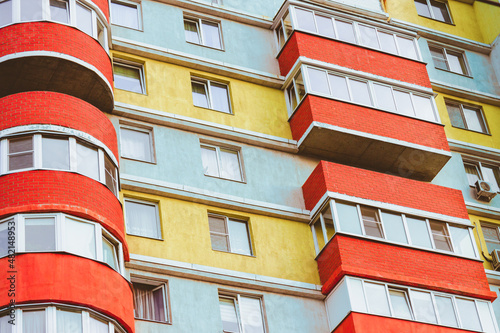facade of an orange, yellow and white building