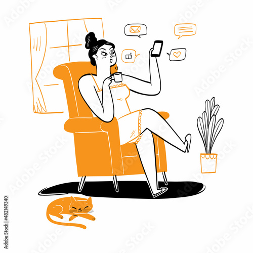The pretty girl in casual clothes on the sofa use the phone to communicate