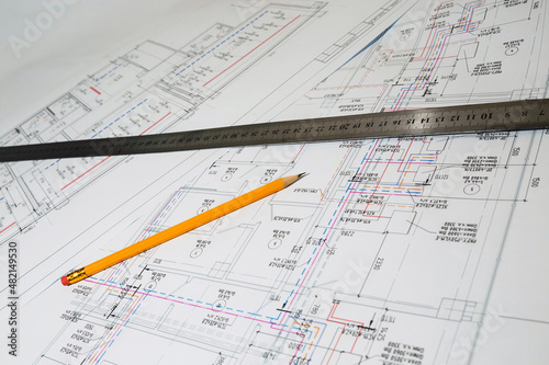Engineering drawings in close-up. Engineering drawings with a ruler and pencils.