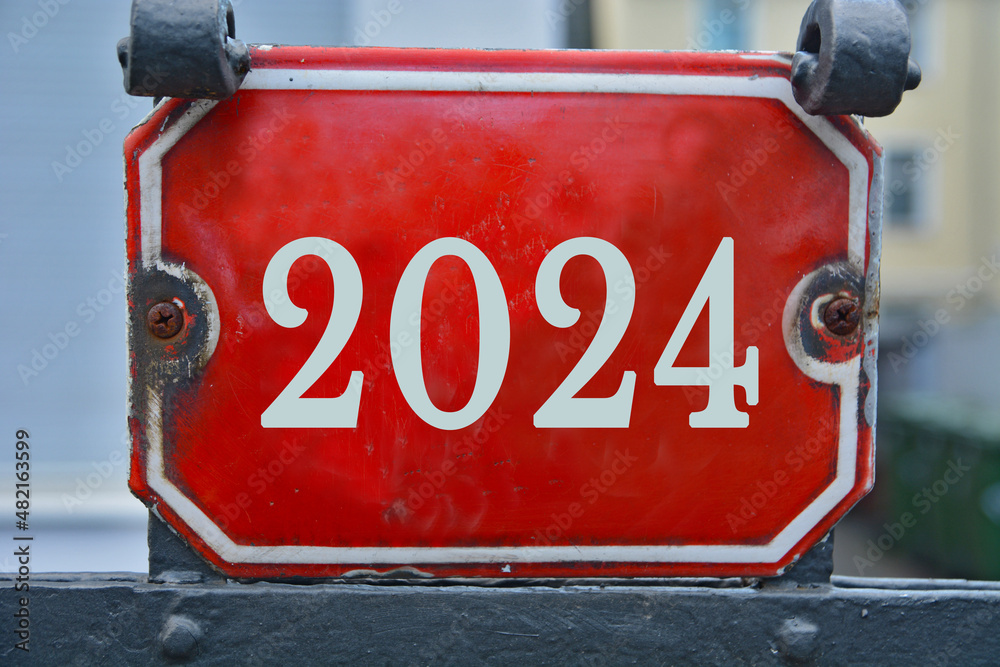 A red house number plaque, showing the two thousand twenty four (2024