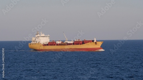 Yellow chemical tanker underway in the North sea