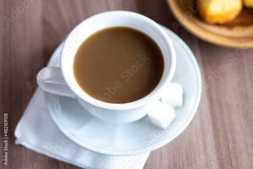Closeup cup of coffee cookies and sugar drink espresso latte aroma beverage mug black hot cafe bakery food pastry morning breakfast nobody