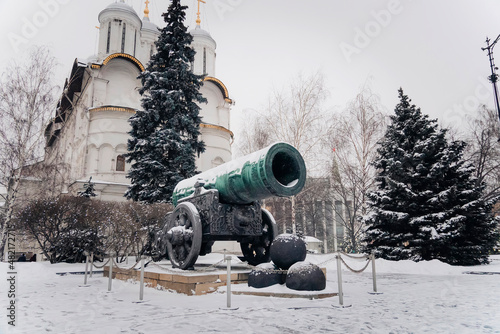 Inside Kremlin's wall - Tsar pushka with Ivan the Great Bell Tower, Ivan the Great Bell and the Dormition Cathedral background in Cathedral Square Moscow Russia.