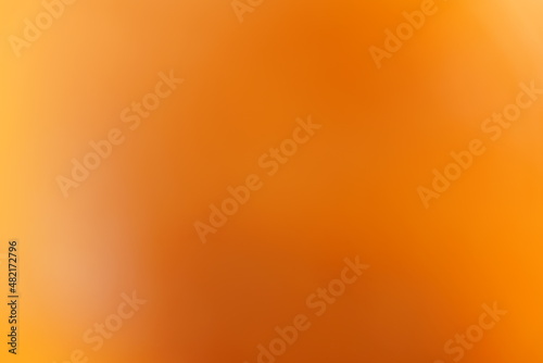 Orange im Detail ihrer Schale und in Nahaufnahme und als nicht fokussierter Hintergrund