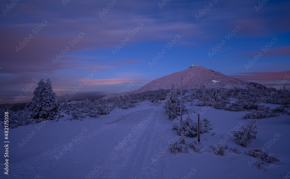 dusk under Sniezka mountain in Karkonosze during winter in Poland