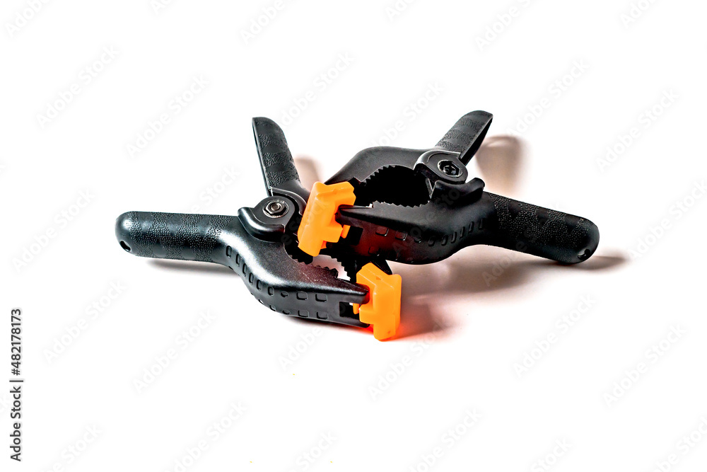 Obraz premium Manual spring clamp, Black plastic spring clamp.