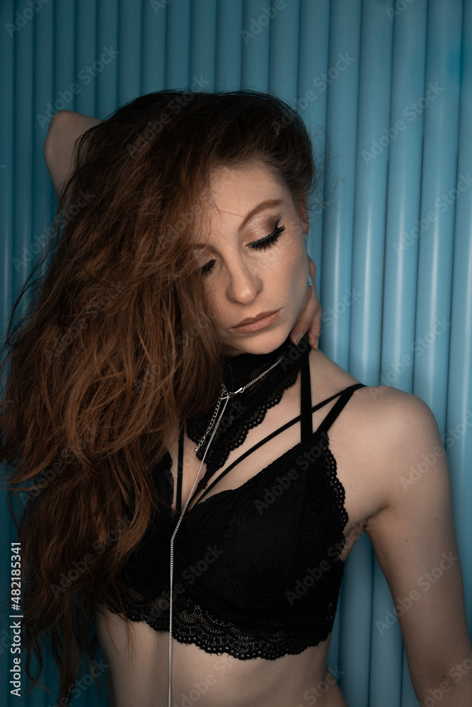 young beautiful latin woman with eyes closed wearing makeup, eyelashes and fashion necklace, face details in eye shadow in studio, beauty young beautiful latin woman with eyes closed wearing makeup, eyelashes and fashion necklace, face details in eye shadow in studio, beauty