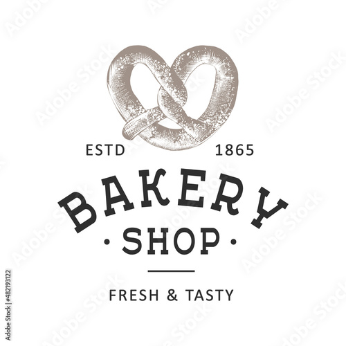 Vintage style bakery shop simple label, badge, emblem, logo template. Graphic food art with engraved pretzel design vector element with typography. Hand drawn organic bagel on white background.
