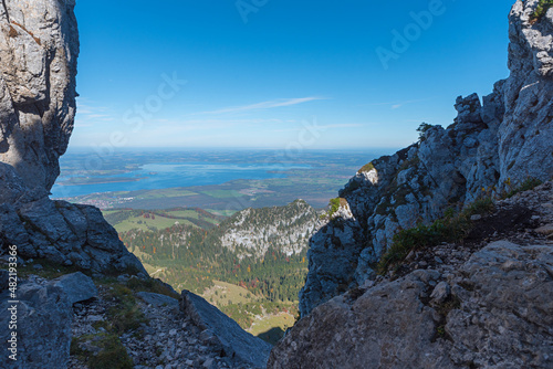 rock passage at Kampenwand mountain, view to lake chiemsee photo