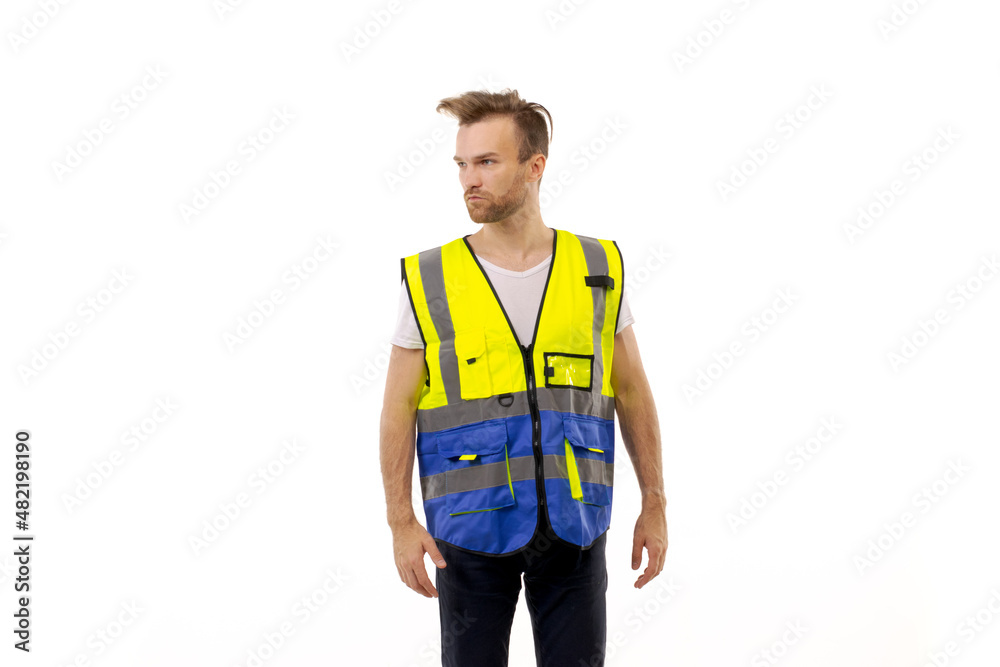 Adult man in uniform work vest standing on white background Adult man in uniform work vest standing on white background