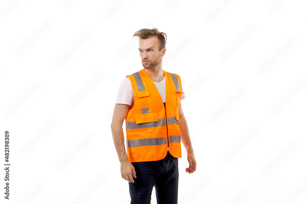 Adult man in uniform work vest standing on white background Adult man in uniform work vest standing on white background