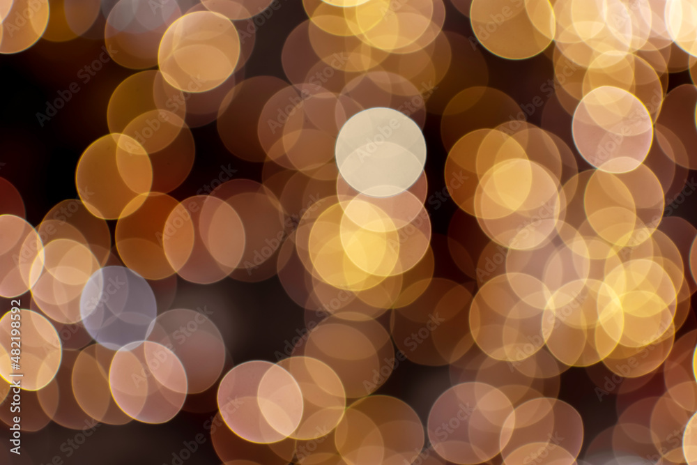 defocus light bokeh golden lights on a dark background defocus light bokeh golden lights on a dark background