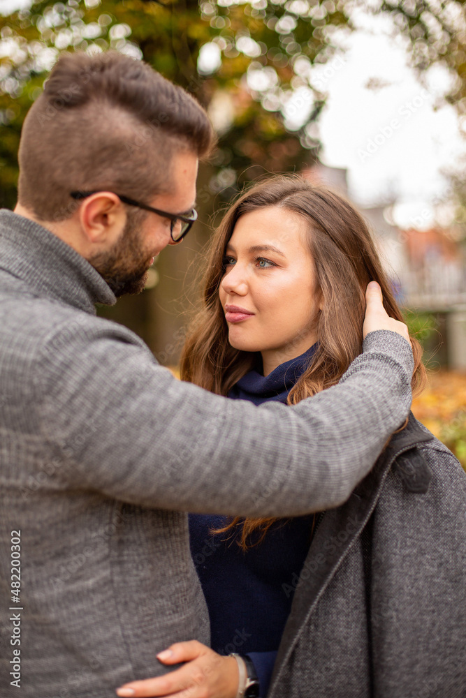 Happy young european married couple portrait in fall