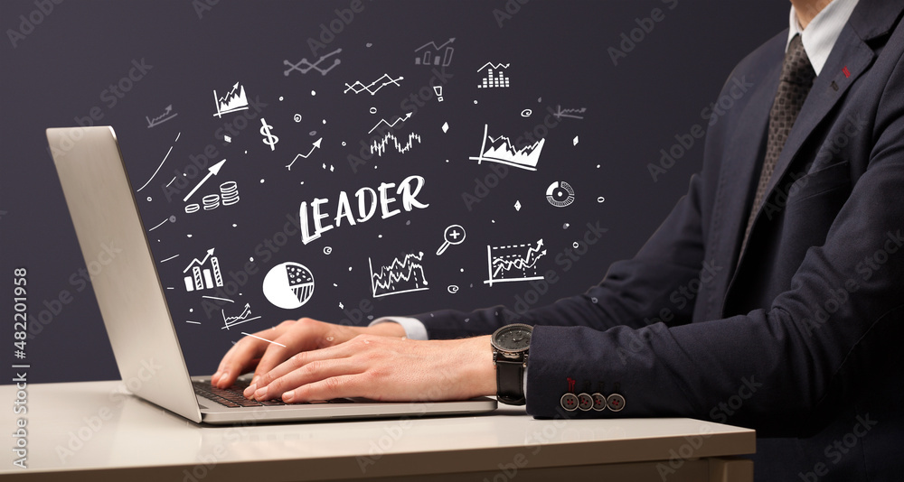 Businessman working on laptop, business concept