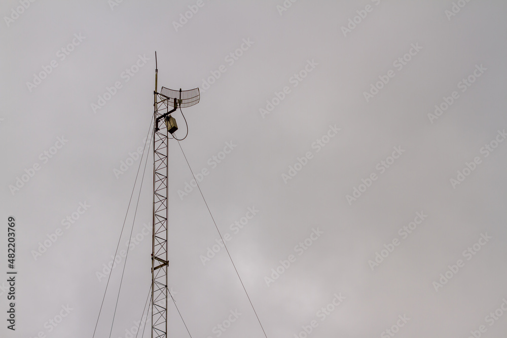 The wifi antenna soars into the sky to pick up the signal and retransmit it, communication in the internet era is growing rapidly during the covid-19 pandemic The wifi antenna soars into the sky to pick up the signal and retransmit it, communication in the internet era is growing rapidly during the covid-19 pandemic