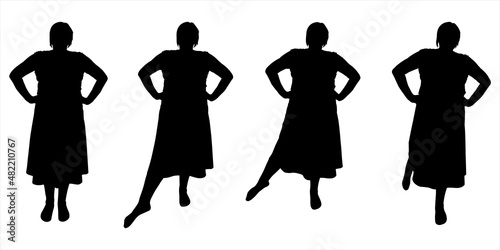 Choreography lesson. Dance teacher. Legs in motion, hands on the belt. Smooth, elegant, graceful leg movements: back, forward, sideways. A group of four women stands straight and moves their legs.