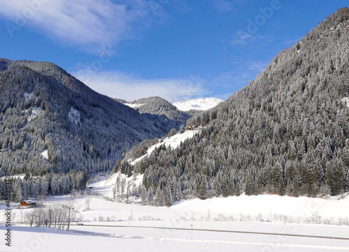 scenico panorama dolomitico immerso nella neve photo