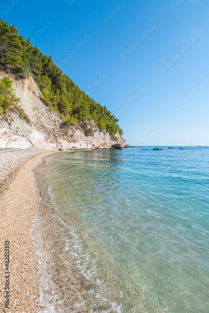 The beautiful beach of San Michele in Sirolo with blue water