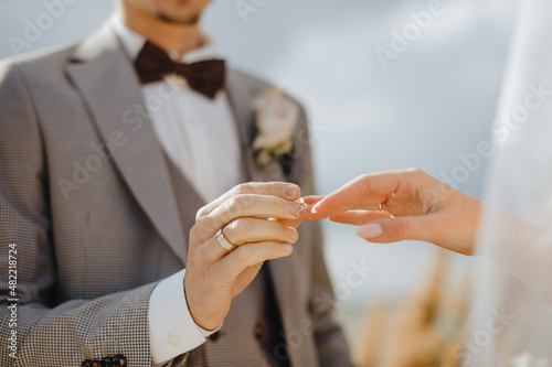 marriage, wedding ceremony, exchange of rings close-up