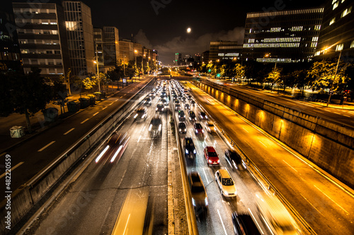 Barcelona, 2018: Cars driving at night at Barcelona highway. City traffic. © NoemiEscribano