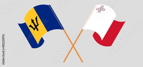 Crossed flags of Barbados and Malta. Official colors. Correct proportion