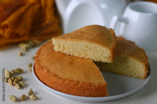 Slice of ghee cake. A version of tea cake with ghee and flavoured with cardamom. Perfect with a cup of hot tea.