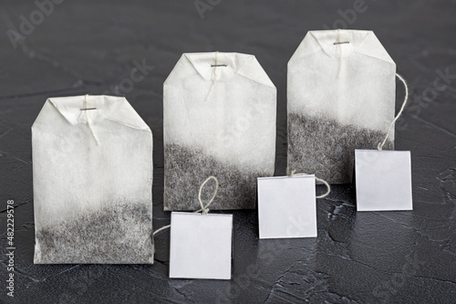 Tea bags with herbs for tea on the table. photo