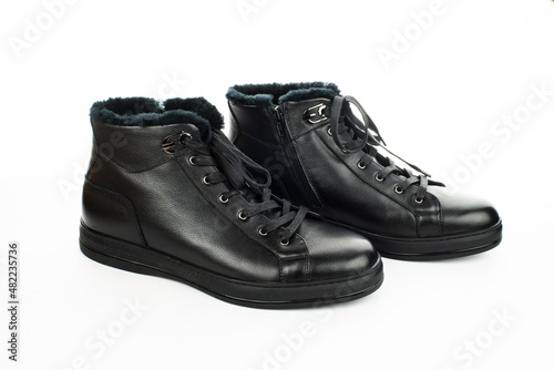 boot isolated. men's leather winter boots on a white background. quality shoes. 