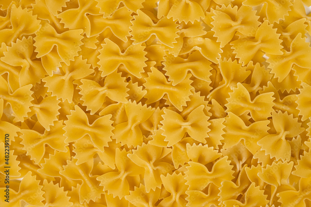 texture of raw noodles pasta italian food macro background texture of raw noodles pasta italian food macro background