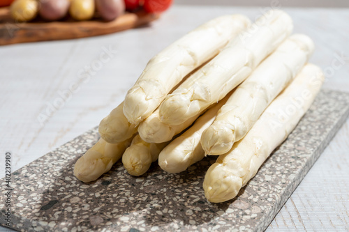New harvest of high quality Dutch white asparagus washed, uncooked