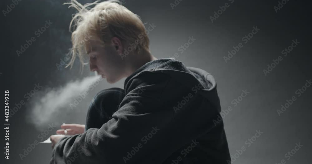 Smoking and looking at the letter Smoking and looking at the letter