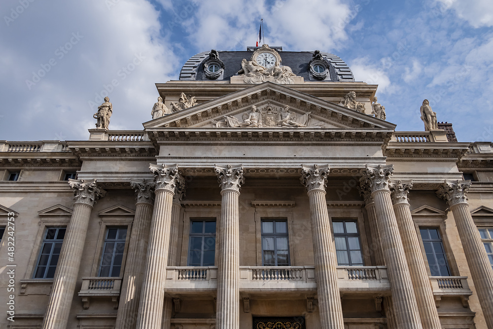 Architectural fragment of the facade of the military school (Ecole Militaire) founded in 1750 in Paris. Central building. Paris, France. Architectural fragment of the facade of the military school (Ecole Militaire) founded in 1750 in Paris. Central building. Paris, France.