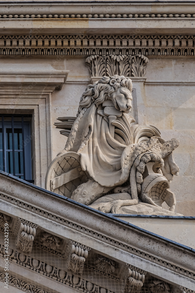 Architectural fragment of the facade of the military school (Ecole Militaire) founded in 1750 in Paris. Central building. Paris, France. 