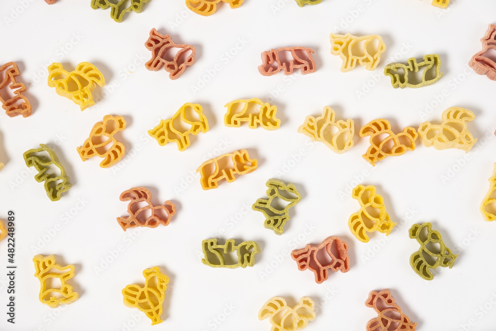 raw trottole tricolore wheat italian food macro on white background raw trottole tricolore wheat italian food macro on white background