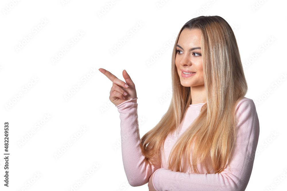 Portrait of beautiful woman pointing isolated on white background Portrait of beautiful woman pointing isolated on white background