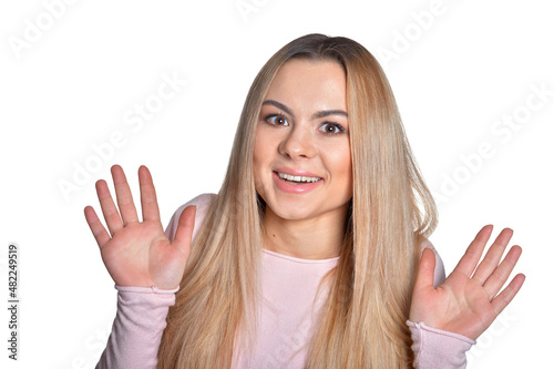 Portrait of beautiful surprised woman isolated on white background